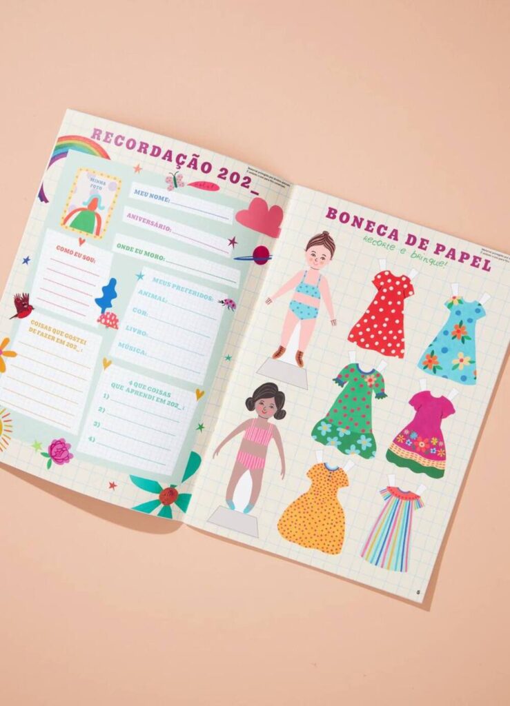 Livro infantil interativo com atividades criativas, bonecas de papel e estímulos ao desenvolvimento infantil.