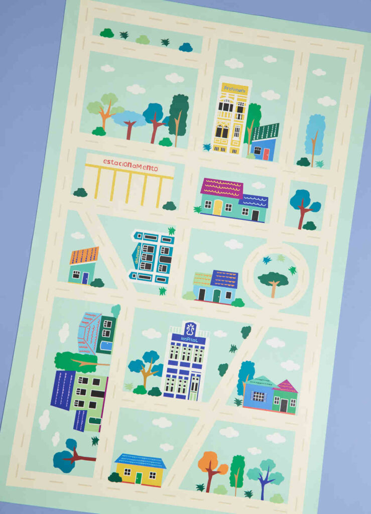 Playmat infantil estampado com ruas, árvores e construções, perfeito para brincadeiras e atividades no chão.